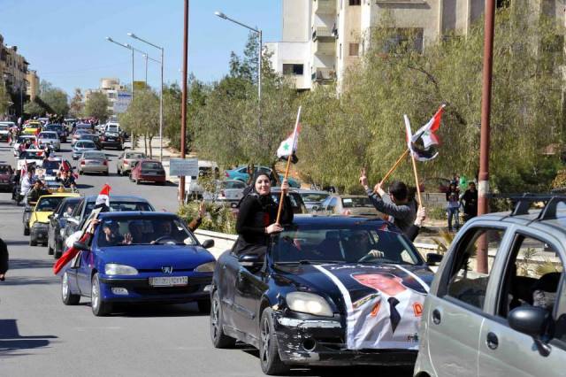 20/02/2014 Les Syriens et Syriennes se mobilisent derrières leurs Armée Arabe Syriennes,leurs Bashar Al-Assad et leurs Drapeau au deux Etoiles Vertes  